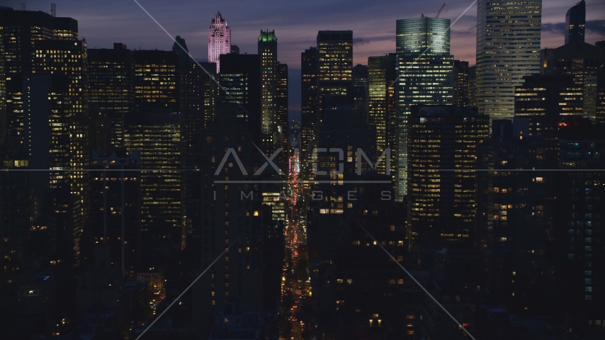 Midtown city canyon at night in New York City Aerial Stock Photos AX121_147.0000052F