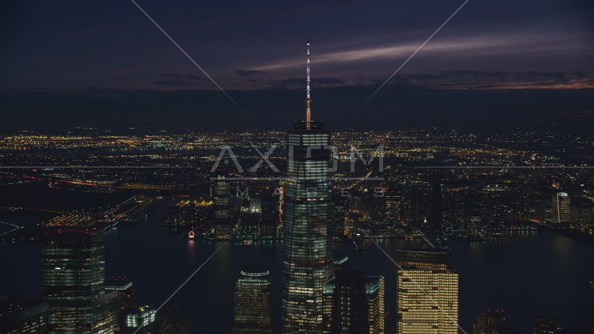 Freedom Tower rising above Lower Manhattan at night in New York City Aerial Stock Photo AX121_161.0000259F | Axiom Images