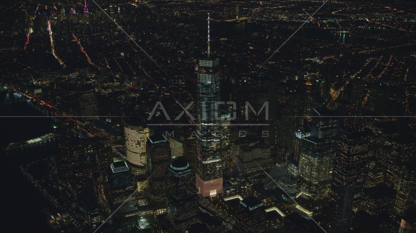 Freedom Tower and the World Trade Center Memorial at night in Lower Manhattan, New York City Aerial Stock Photos AX121_174.0000176F