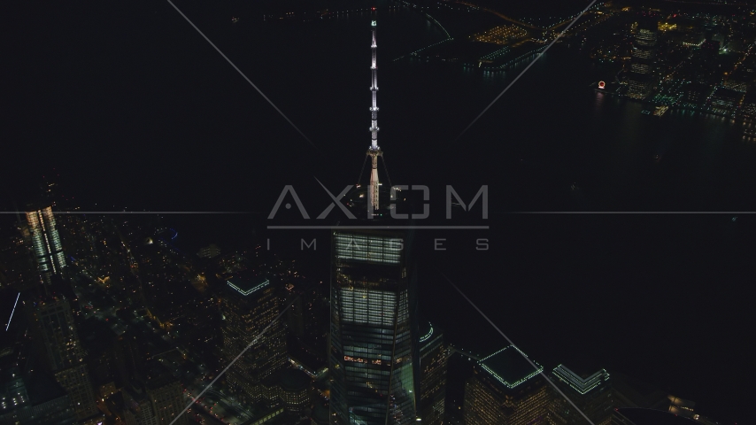 The spire on top of Freedom Tower at night in Lower Manhattan, New York City Aerial Stock Photos AX121_180.0000105F