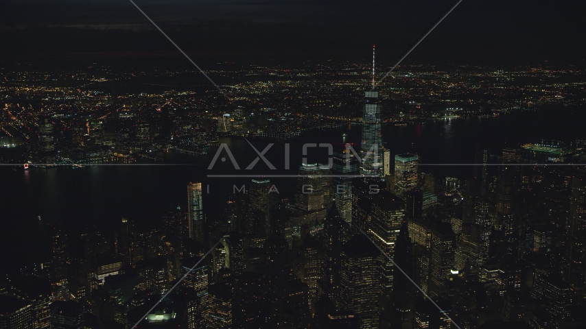 Freedom Tower and World Trade Center skyscrapers at night in New York City Aerial Stock Photos AX121_189.0000150F
