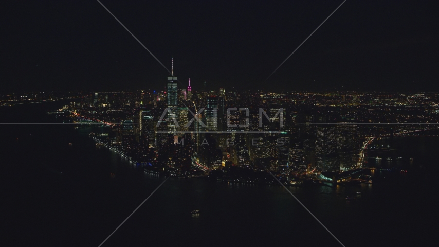 Lower Manhattan seen from New York Harbor at night in New York City Aerial Stock Photos AX121_194.0000179F