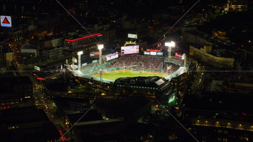 A baseball game at Fenway Park in Boston, Massachusetts, night Aerial Stock Photo AX141_180.0000136 | Axiom Images