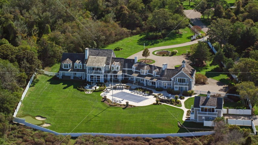 A spacious mansion with green lawns on Cape Cod, Dennis, Massachusetts Aerial Stock Photo AX143_167.0000143 | Axiom Images
