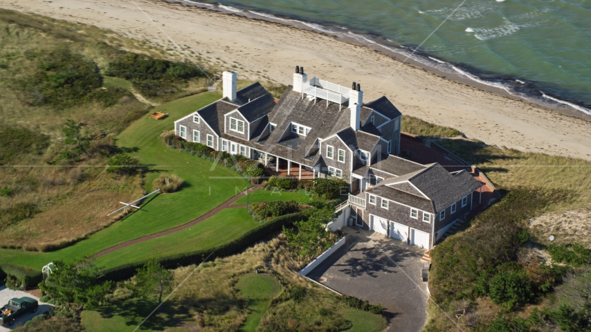 An upscale beachfront home in Nantucket, Massachusetts Aerial Stock Photo AX144_107.0000277 | Axiom Images