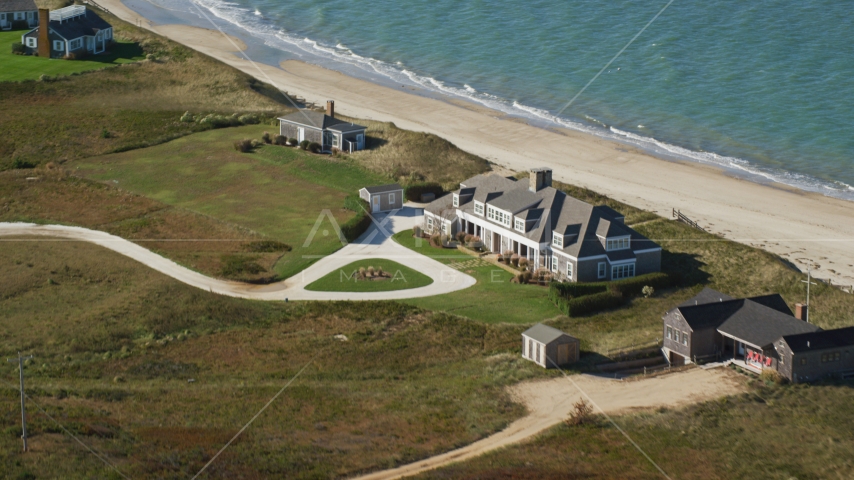 An upscale home by the beach in Nantucket, Massachusetts Aerial Stock Photo AX144_111.0000000 | Axiom Images