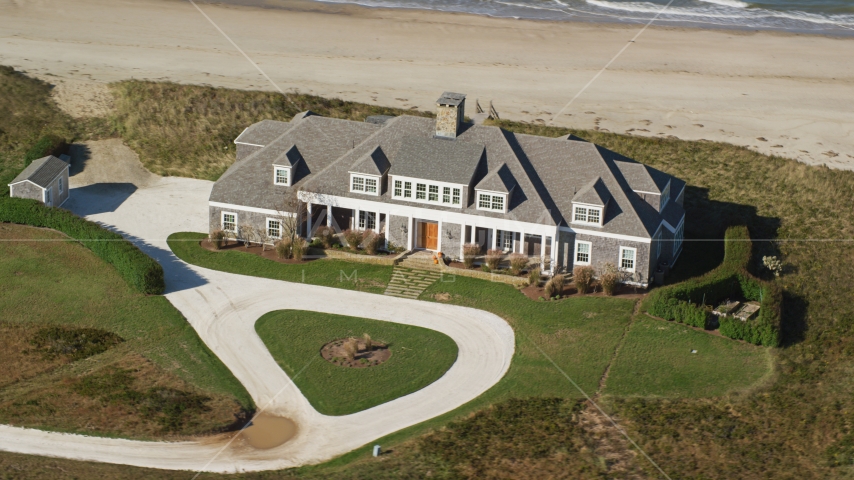 A beautiful home by the beach in Nantucket, Massachusetts Aerial Stock Photo AX144_111.0000154 | Axiom Images
