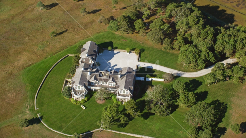 A bird's eye view of an isolated mansion on Chappaquiddick Island, Martha's Vineyard, Massachusetts Aerial Stock Photo AX144_129.0000086 | Axiom Images