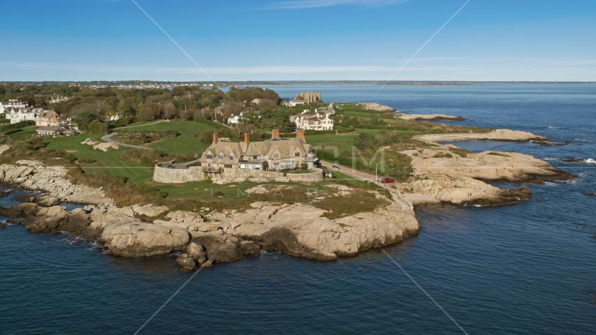 An oceanfront mansion beside coastal cliffs, Newport, Rhode Island Aerial Stock Photo AX144_252.0000017 | Axiom Images