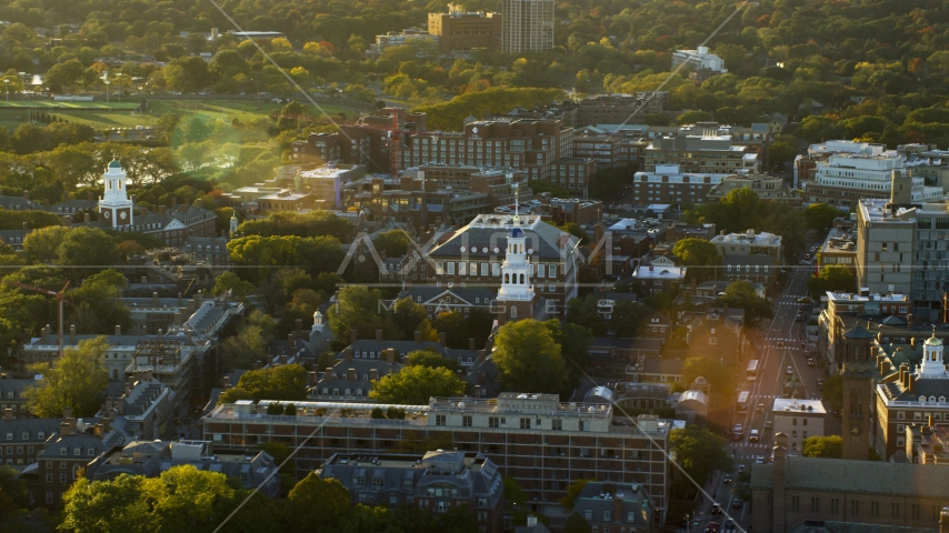 A view of Harvard University buildings at sunset in Cambridge, Massachusetts Aerial Stock Photo AX146_026.0000281F | Axiom Images