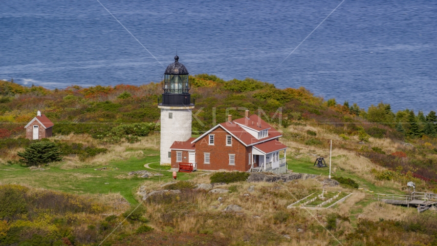 Seguin Light on Seguin Island with fall foliage, Phippsburg, Maine Aerial Stock Photo AX147_393.0000263 | Axiom Images
