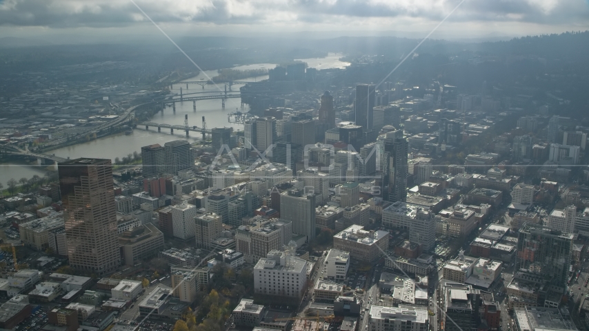The Willamette River and bridges near skyscrapers in Downtown Portland, Oregon Aerial Stock Photos AX153_077.0000332F