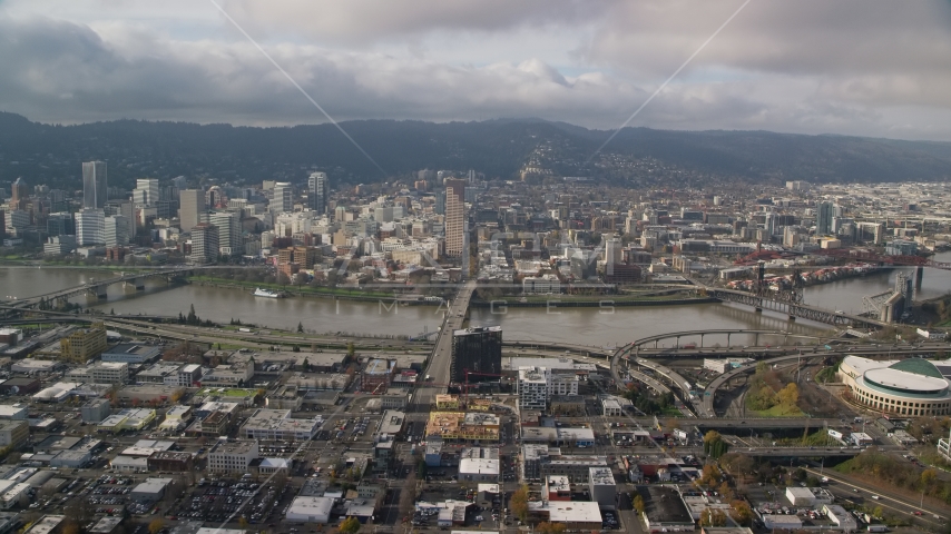 The Burnside Bridge and skyscrapers in Downtown Portland, Oregon Aerial Stock Photos AX153_104.0000091F