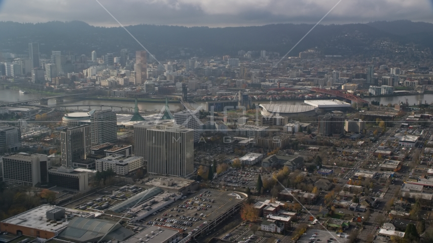 Downtown Portland behind office buildings and Moda Center, Oregon Aerial Stock Photos AX153_111.0000319F
