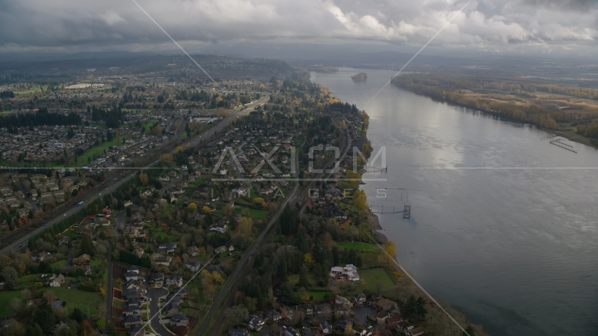 Suburban riverfront houses by Highway 14 in Vancouver, Washington Aerial Stock Photos AX153_141.0000021F