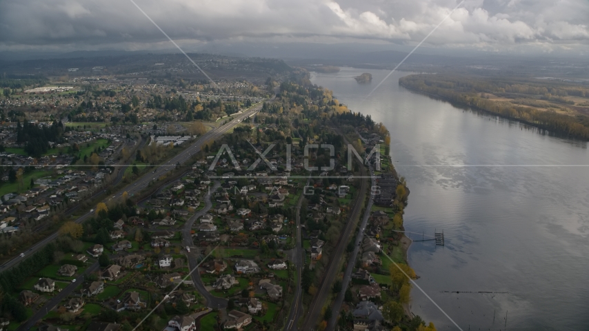 Suburban riverfront neighborhoods by Highway 14 in Vancouver, Washington Aerial Stock Photos AX153_141.0000277F