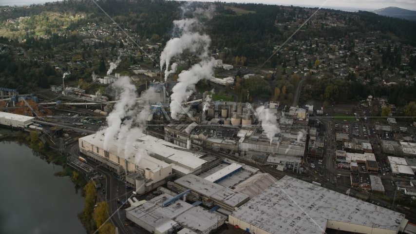 The Georgia Pacific Paper Mill with steam rising in Camas, Washington Aerial Stock Photo AX153_153.0000255F | Axiom Images