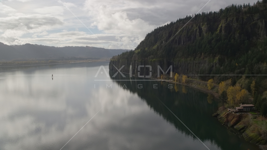 An isolated home overlooking the river in Columbia River Gorge, Washington Aerial Stock Photos AX154_008.0000156F