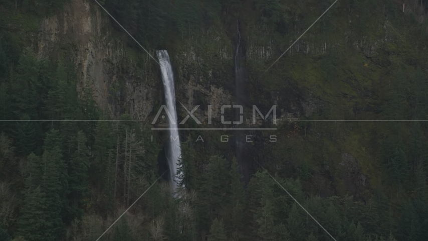 A view of Multnomah Falls on the Oregon side of Columbia River Gorge Aerial Stock Photos AX154_021.0000154F | Axiom Images