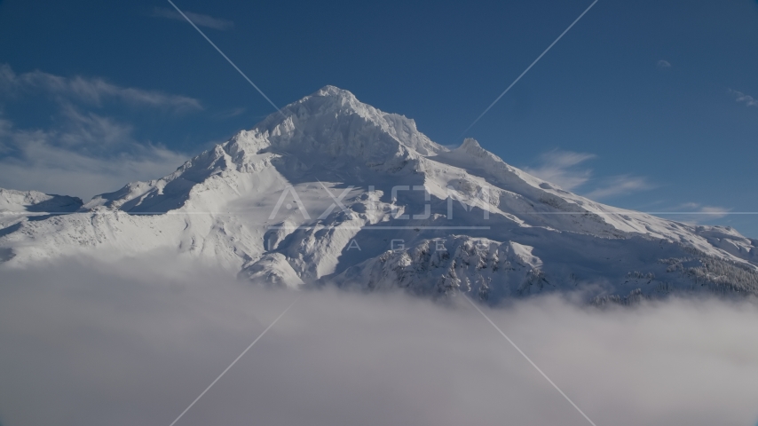 A view of snow-covered Mount Hood, Cascade Range, Oregon Aerial Stock Photos AX154_078.0000000F