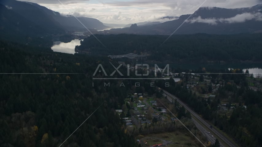 Evergreens by Interstate 84 in the town of Cascade Locks, Oregon in Columbia River Gorge Aerial Stock Photos AX154_170.0000035F