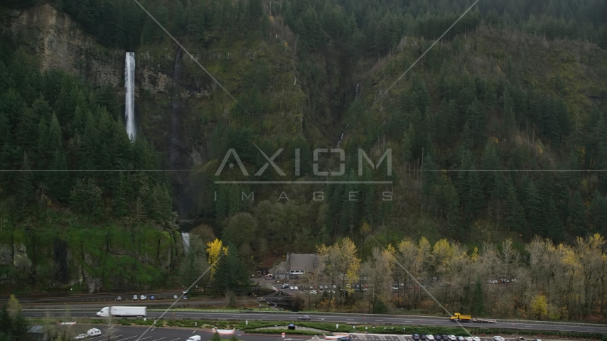 The I-84 highway below Multnomah Falls on a cliff face of the Columbia River Gorge Aerial Stock Photos AX154_189.0000235F