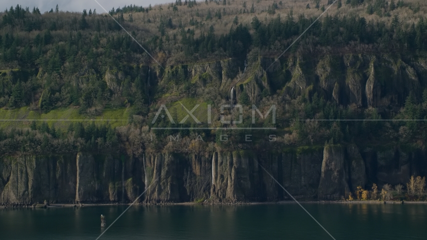 Waterfalls and steep green cliffs on the Washington side of Columbia River Gorge Aerial Stock Photos AX154_193.0000000F
