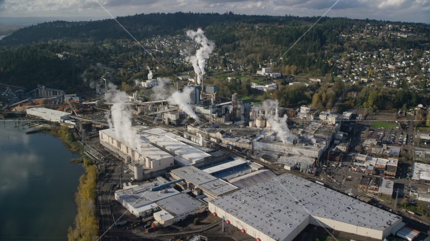 Steam rising from the Georgia Pacific Paper Mill in Camas, Washington Aerial Stock Photos AX154_213.0000037F