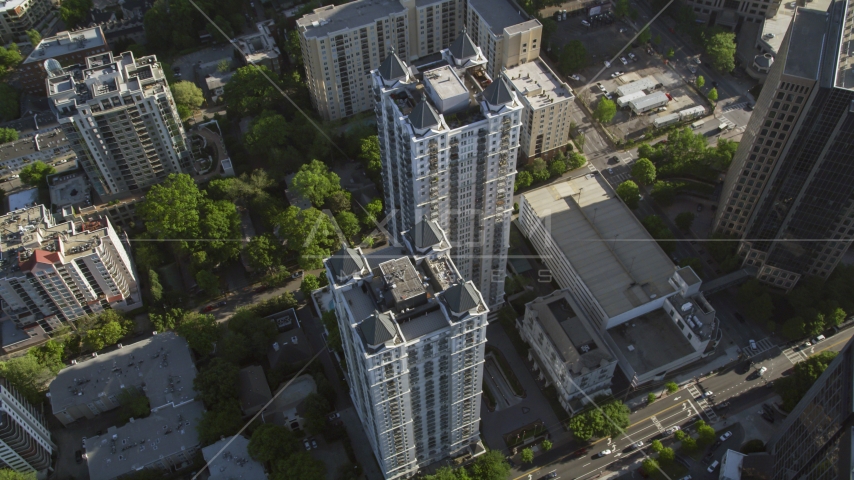 Tilt down on a condominium complex, Midtown Atlanta, Georgia Aerial Stock Photo AX38_068.0000082F | Axiom Images