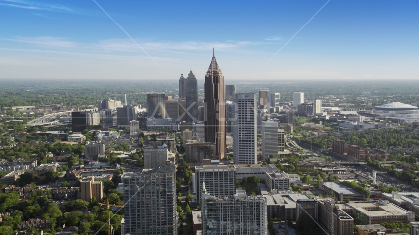 Bank of America Plaza towering over city buildings, Midtown Atlanta, Georgia Aerial Stock Photo AX38_069.0000036F | Axiom Images