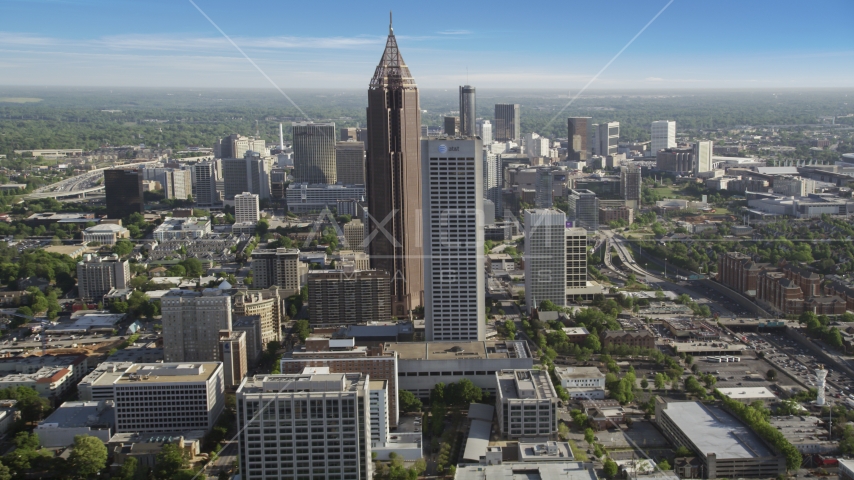 Skyscrapers towering over citiy buildings, Midtown Atlanta, Georgia Aerial Stock Photo AX38_069.0000285F | Axiom Images