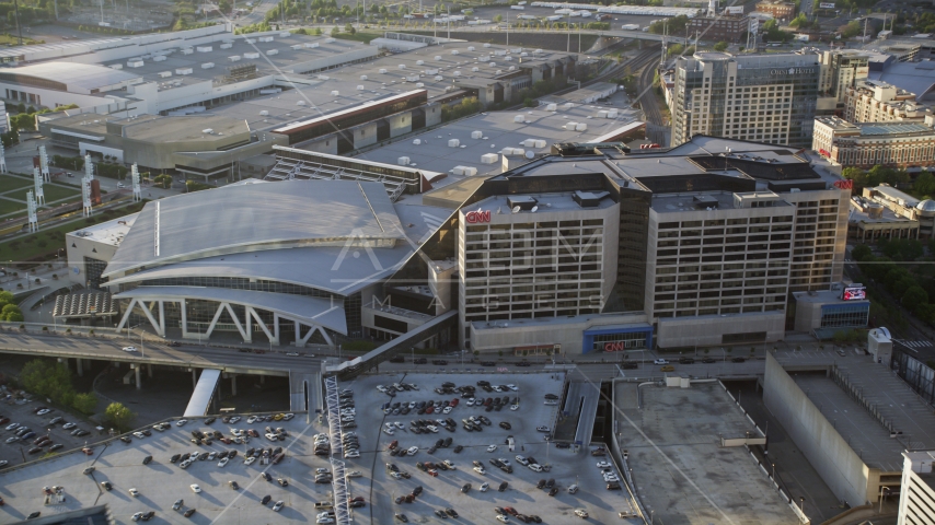 CNN Center and Philips Arena at sunset, Downtown Atlanta, Georgia Aerial Stock Photo AX39_046.0000205F | Axiom Images