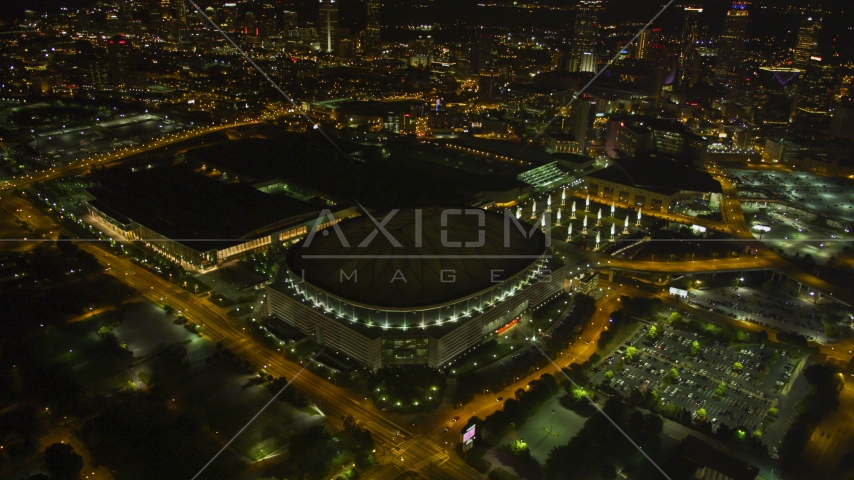 Georgia Dome football stadium in Downtown Atlanta, night Aerial Stock Photo AX41_064.0000000F | Axiom Images