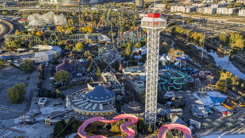 Rides and roller coasters at Elitch Gardens theme park at sunrise, Downtown Denver, Colorado Aerial Stock Photo DXP001_000116 | Axiom Images