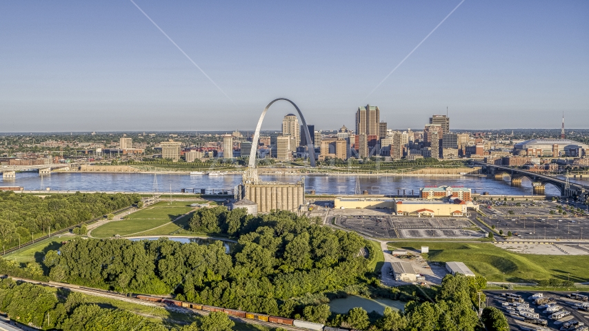 A park and grain elevator by the river with views of the Arch and skyline, Downtown St. Louis ...