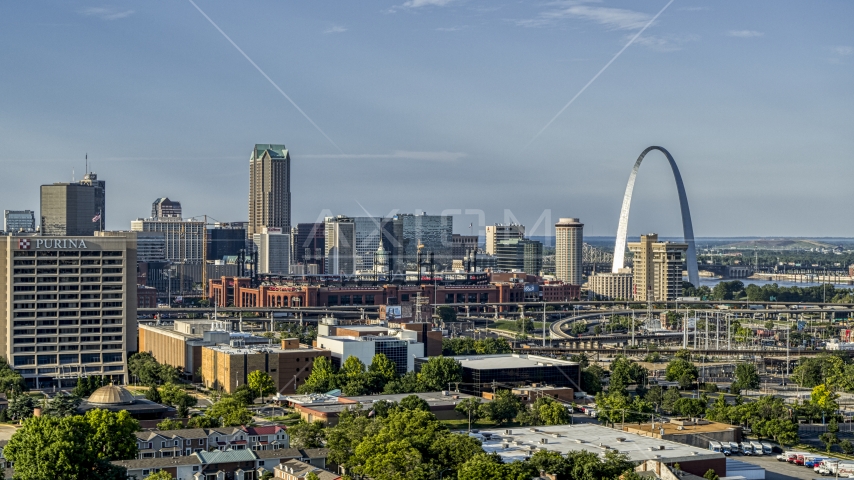 An office building and a sports stadium near the Gateway Arch in Downtown St. Louis, Missouri Aerial Stock Photo DXP001_033_0003 | Axiom Images