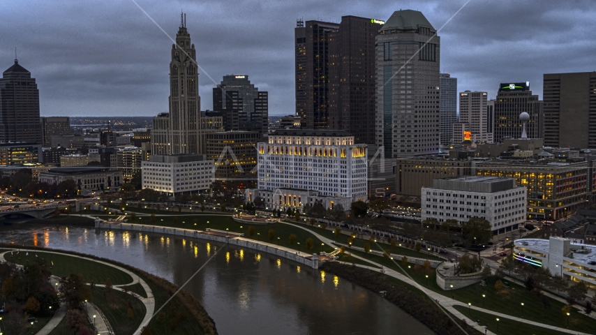 The city skyline and the Scioto River at twilight, Downtown Columbus, Ohio Aerial Stock Photos DXP001_087_0007