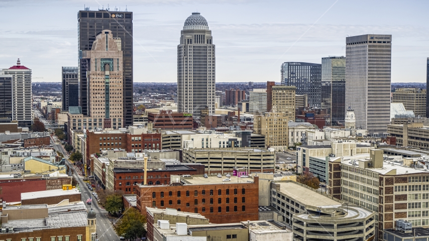 The city skyline from brick city buildings in Downtown Louisville, Kentucky Aerial Stock Photos DXP001_095_0002