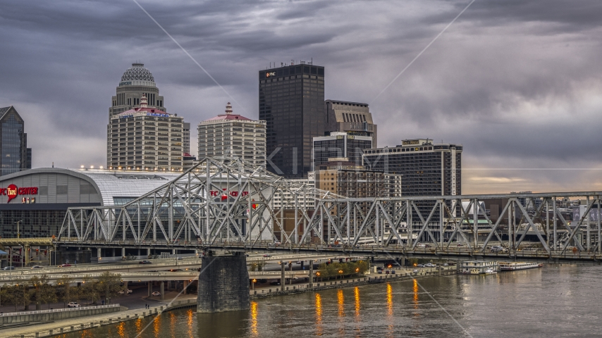 The downtown skyline lit up at twilight, seen from Ohio River, Downtown Louisville, Kentucky Aerial Stock Photos DXP001_096_0004