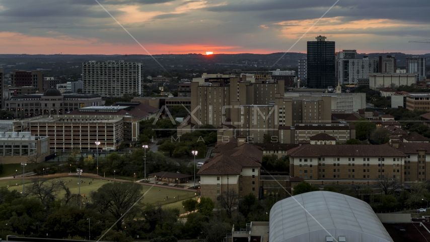 The university campus with setting sun in distance, Austin, Texas Aerial Stock Photo DXP002_105_0014 | Axiom Images