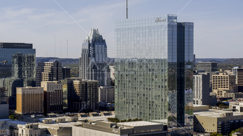 Frost Bank Tower and a high-rise hotel in Downtown Austin, Texas Aerial Stock Photo DXP002_108_0011 | Axiom Images