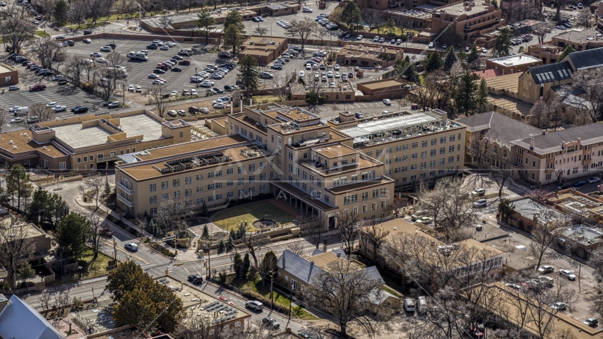 A large hotel in the city's downtown area, Santa Fe, New Mexico Aerial Stock Photo DXP002_129_0014 | Axiom Images