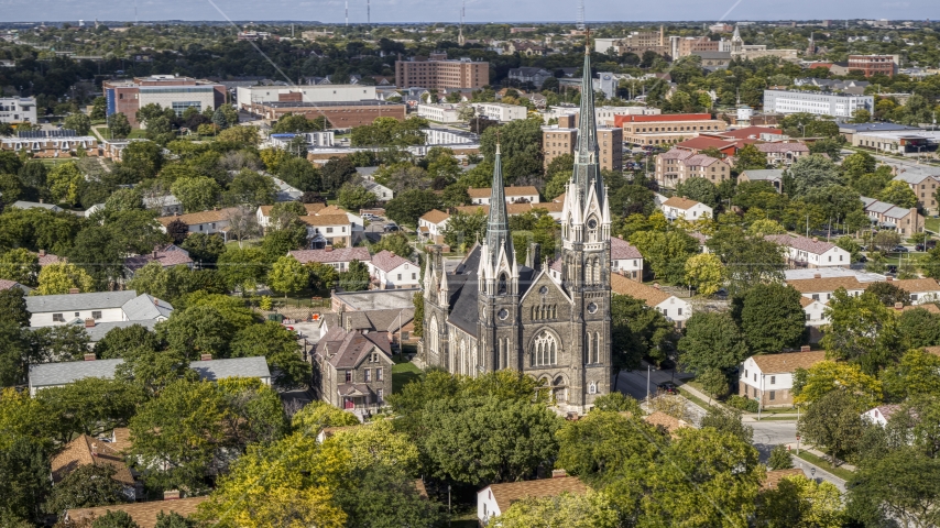 A church in a residential neighborhood in Milwaukee, Wisconsin Aerial Stock Photo DXP002_152_0006 | Axiom Images