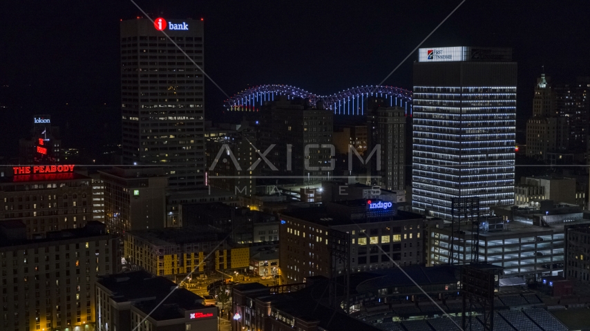 City buildings between office towers at nighttime, Downtown Memphis, Tennessee Aerial Stock Photo DXP002_188_0003 | Axiom Images