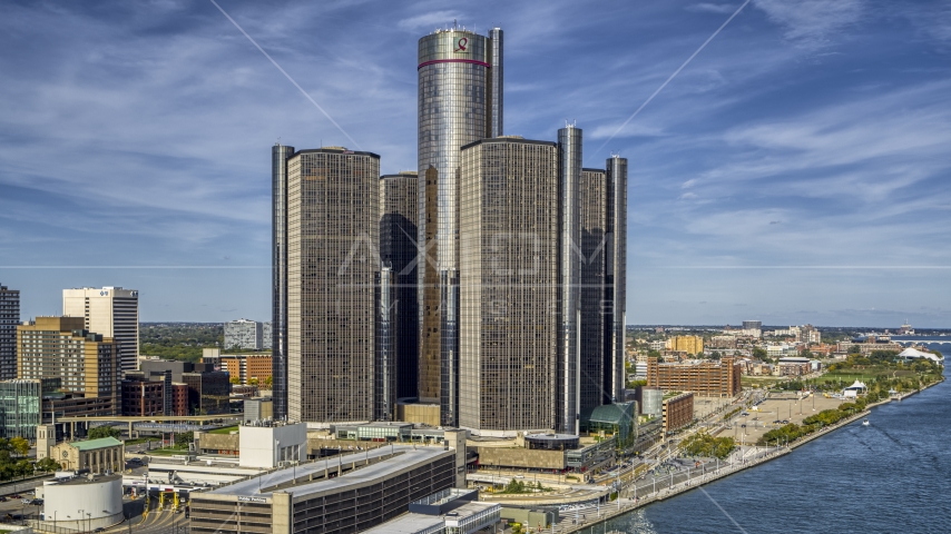 The GM Renaissance Center beside the river in Downtown Detroit, Michigan Aerial Stock Photo DXP002_196_0006 | Axiom Images