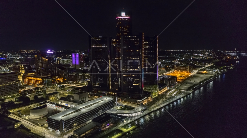 The GM Renaissance Center by the river at night, Downtown Detroit, Michigan Aerial Stock Photo DXP002_199_0004 | Axiom Images