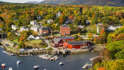 A small coastal town beside a harbor in autumn, Rockport, Maine Aerial 