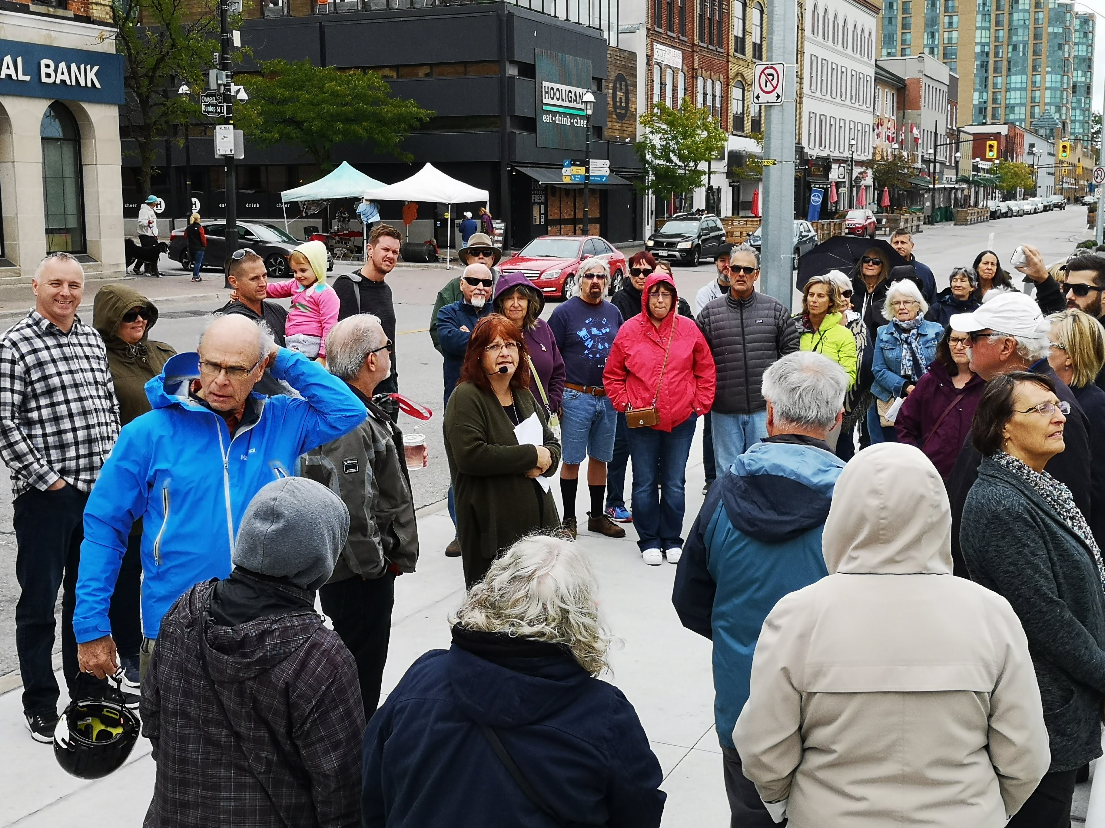 A group gathers near Meridian Place during the Places in Time tour.