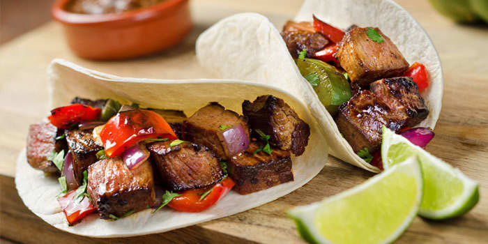 Steak Tacos With Red Peppers and Onions