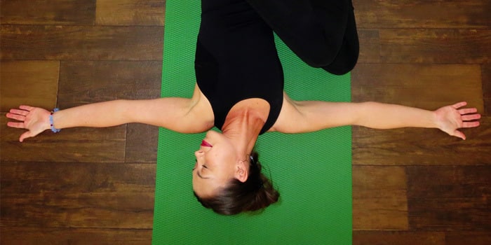 7 Stretches You Can Do Anywhere Using a Wall